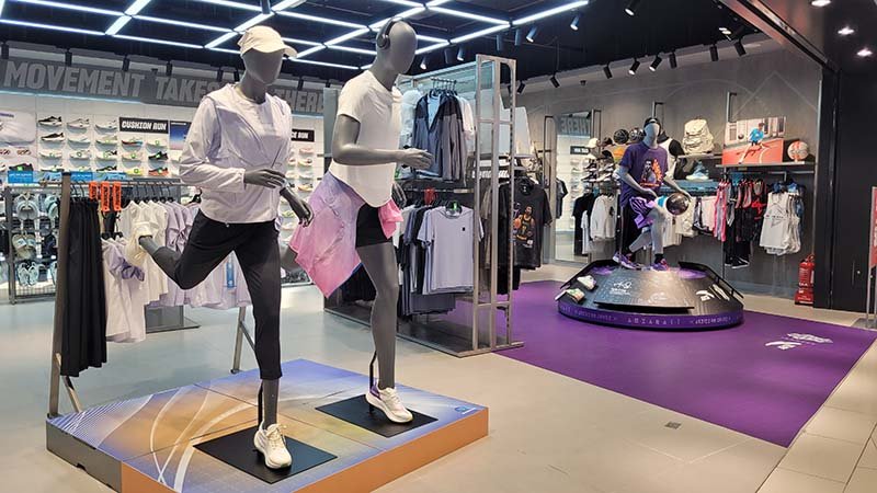 Custom branded activewear being designed on a tablet