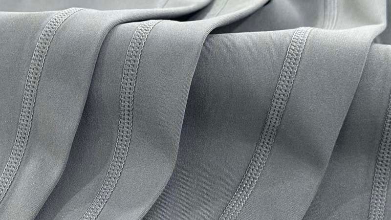 a close-up shot of a flatlock seam on a pair of high-quality leggings