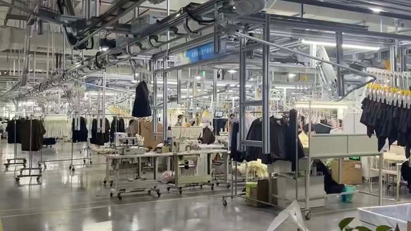 Vetting a Manufacturing Partner A brand owner having a video call with a potential sportswear manufacturer.