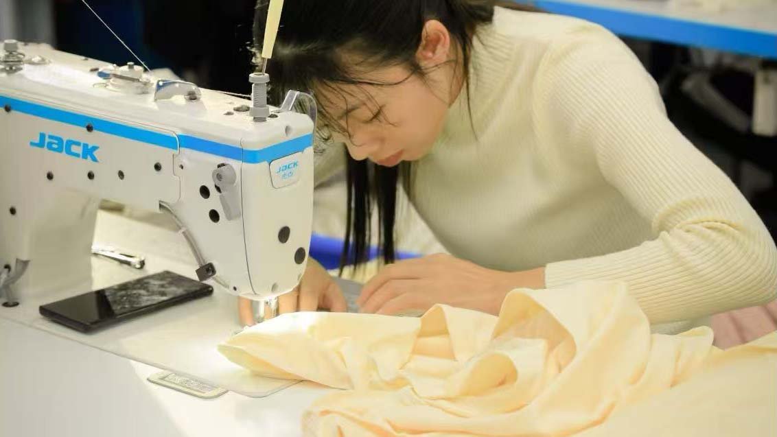 a calendar with a factory icon and a ship icon, showing a timeline